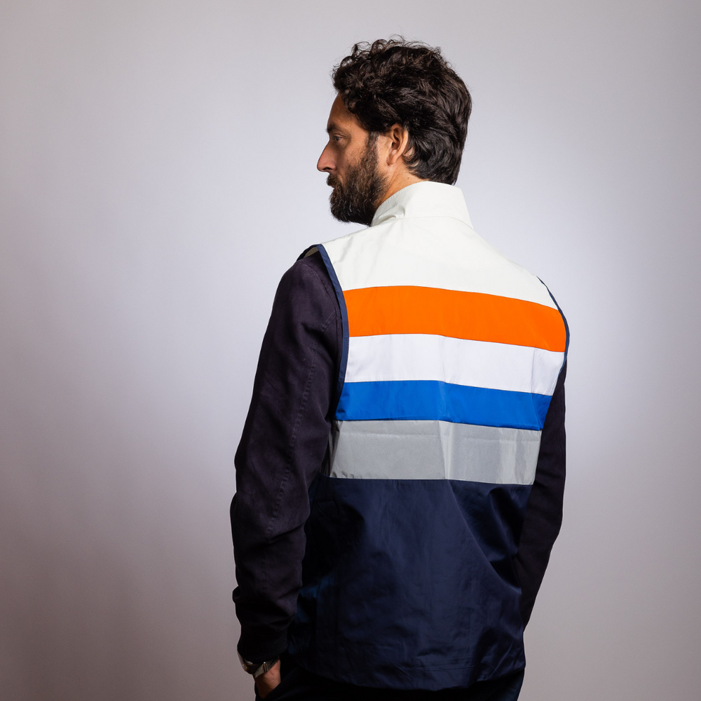 
                      
                        Veste réfléchissante - Polyester 100% recyclé
                      
                    