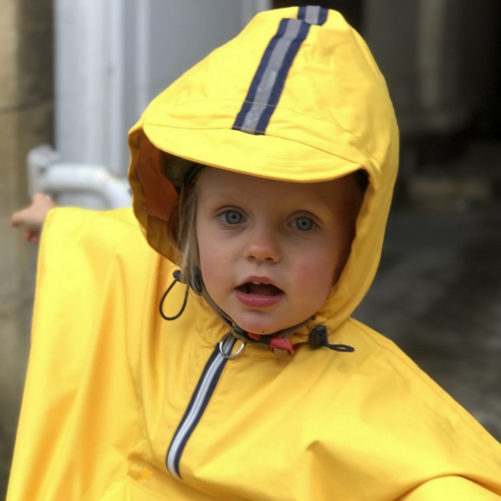 
                      
                        Capuche de la cape de pluie enfant 5-7 ans pour une protection optimale.
                      
                    